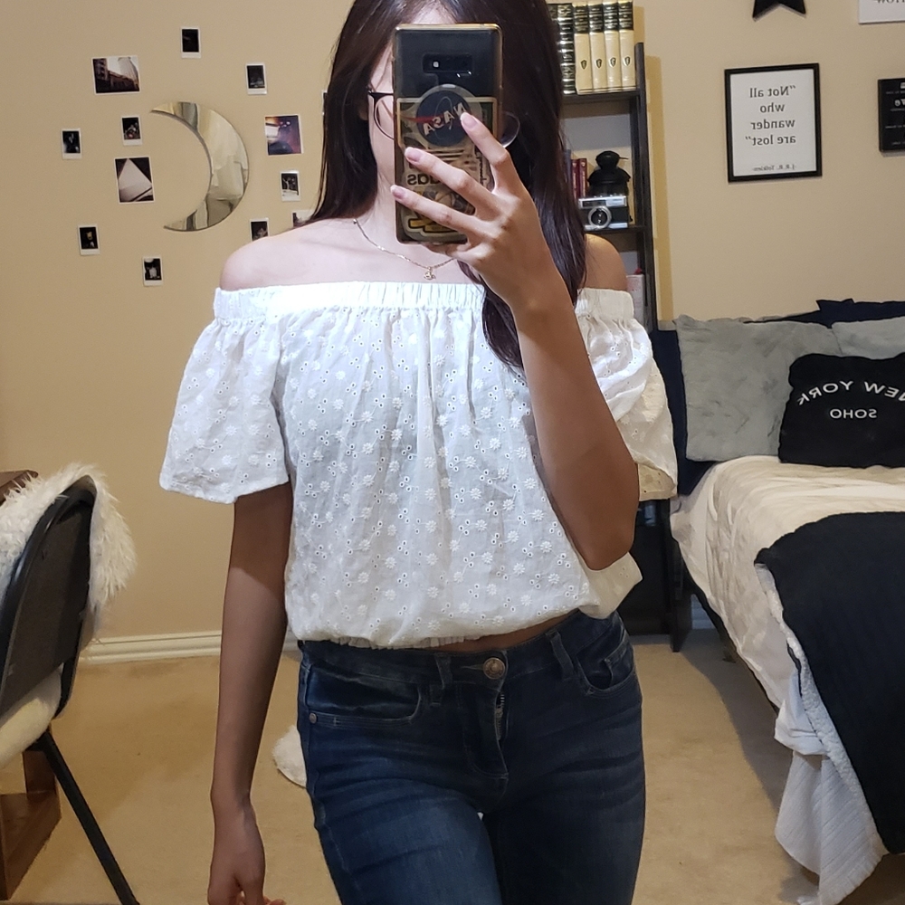 White sleeveles top